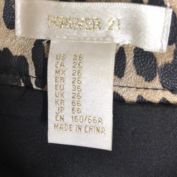 Faux leather leopard mini skirt size 26 - Picture 8 of 8